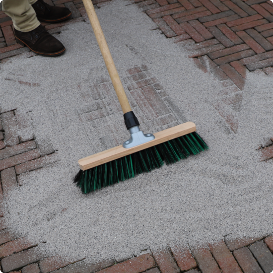 Romfix onkruid-werend inveegzand 20 kg Steengrijs